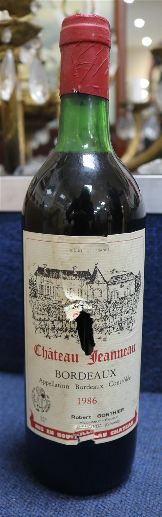 Twenty four bottles of Chateau Jeanneau, Bordeaux, 1986.